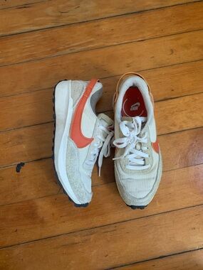 Nike Women's Cream Runner Sneakers with Orange Swoosh